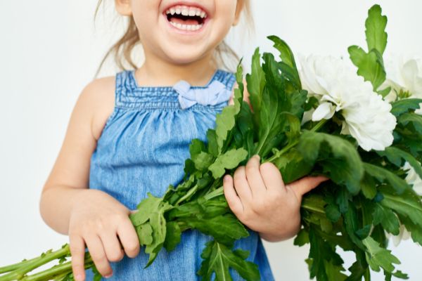 child with flowers